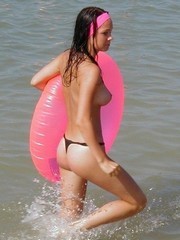 Very hot long-haired chick swimming full